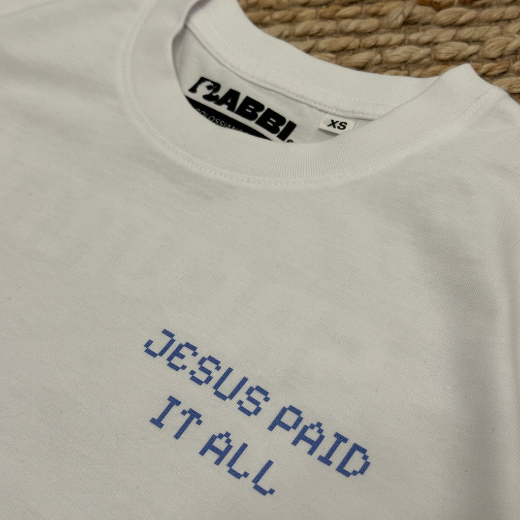 Baggy embroidered t-shirt with "Jesus Paid It All" design in blue on a white cotton tee.