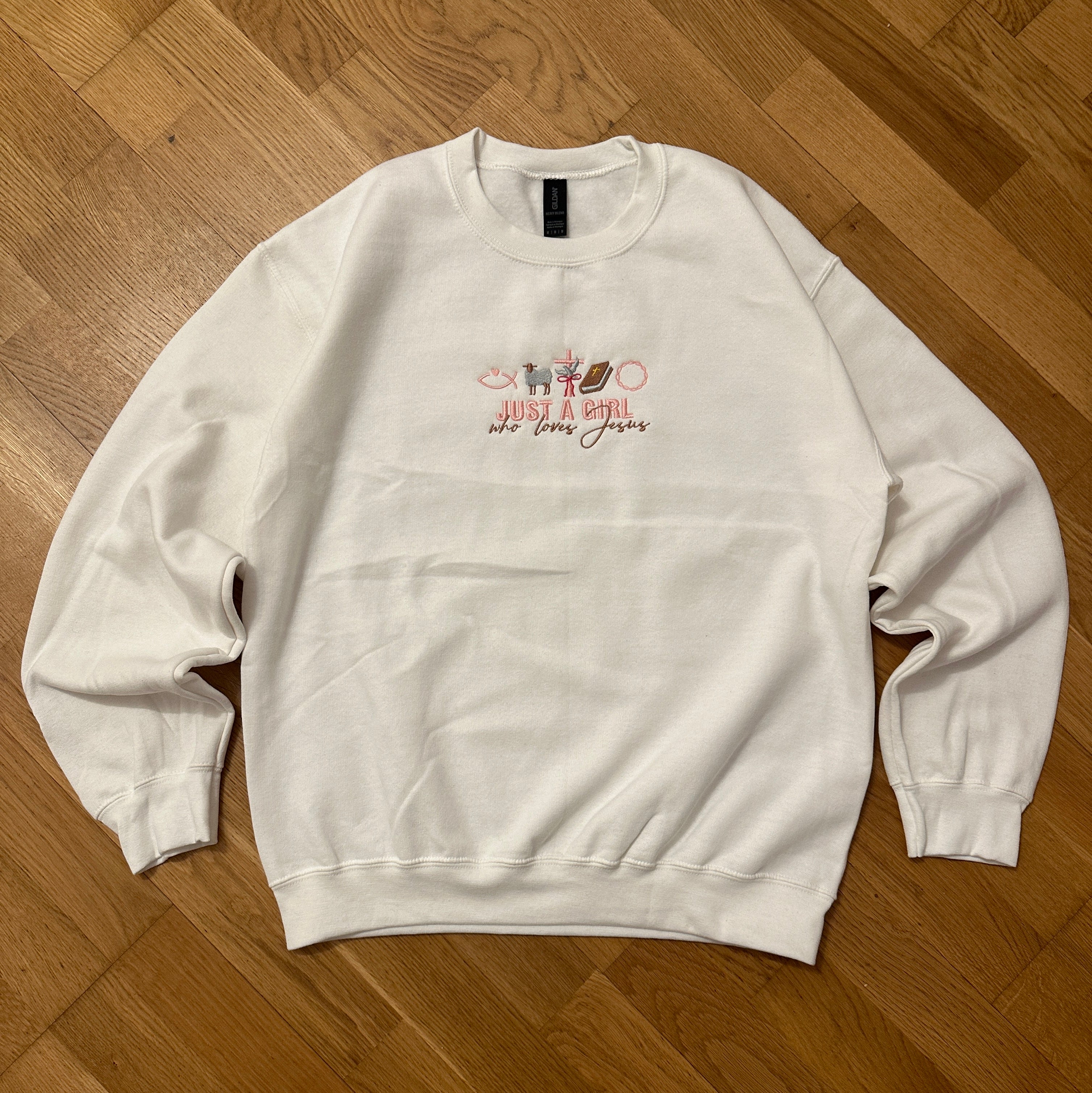 Just A Girl Who Loves Jesus - Embroidered Classic Unisex Crewneck Sweatshirt