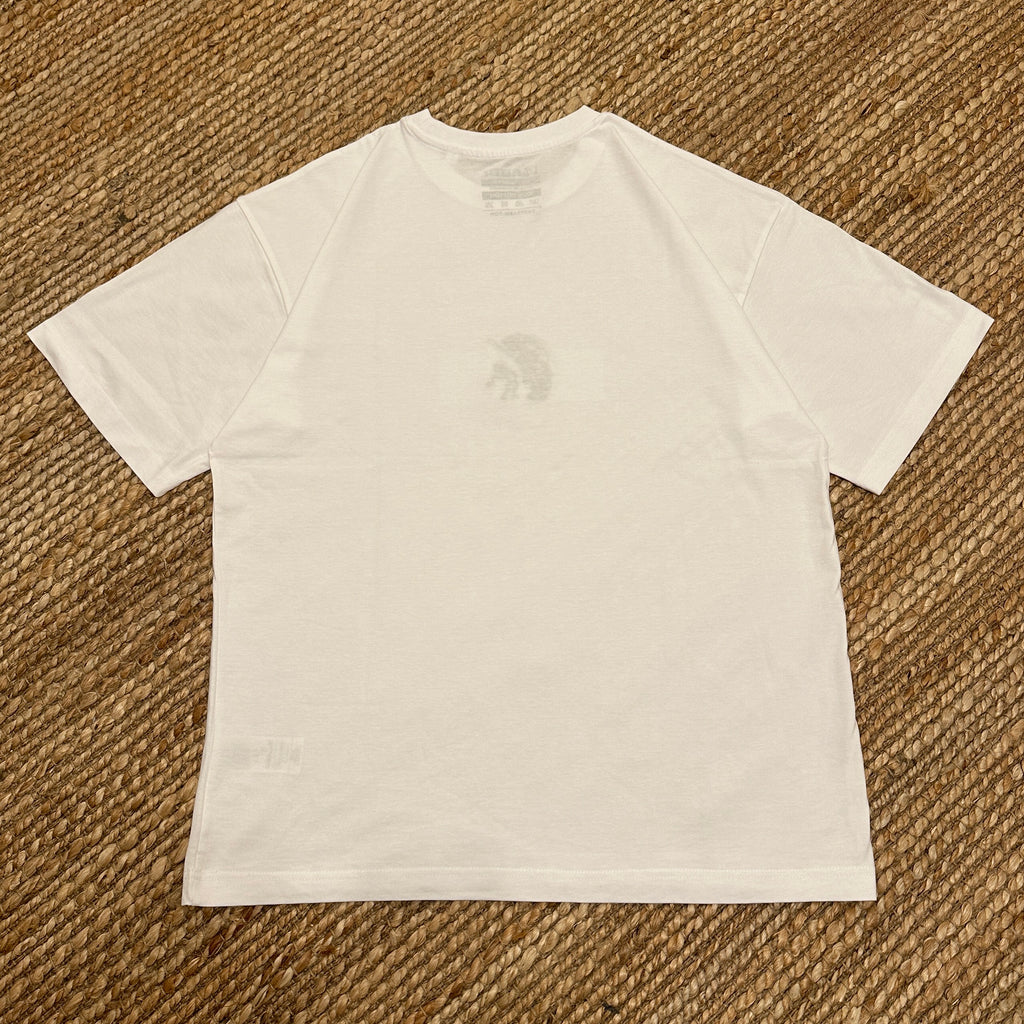 OVERSIZED Embroidered T-shirt displayed on a textured background, highlighting its unique oversized fit and design.